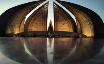 Symmetrical reflection of the Pakistan Monument architectural petals on the marble floor during sunset in Islamabad.