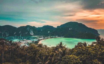 Aerial view of Phi Phi Island twin bays and limestone cliffs in Thailand during sunset