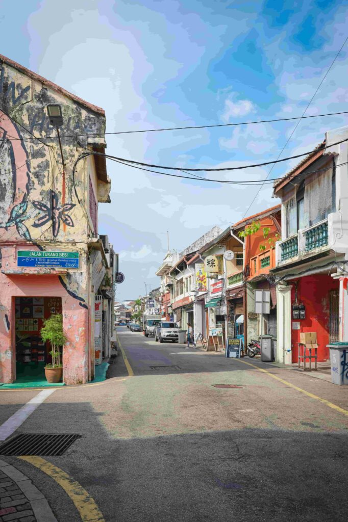 Colourful heritage shophouses and street art along Blacksmith Street (Jalan Tukang Besi) in George Town, Penang, Malaysia