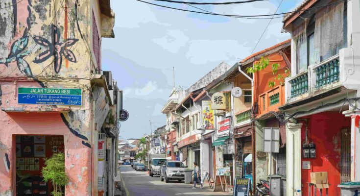 Colourful heritage shophouses and street art along Blacksmith Street (Jalan Tukang Besi) in George Town, Penang, Malaysia