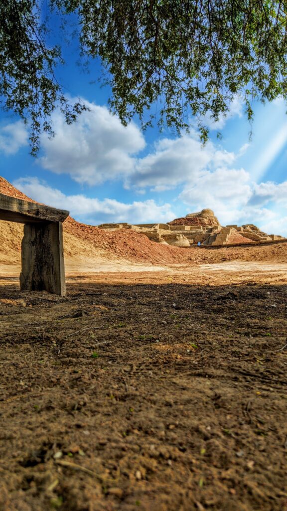 Mohenjo-daro ancient ruins with wooden gate and blue sky Sindh Pakistan